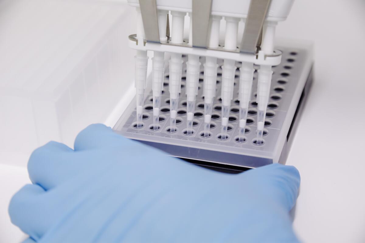 A nurse prepares materials for monkeypox testing at a hospital in Madrid.