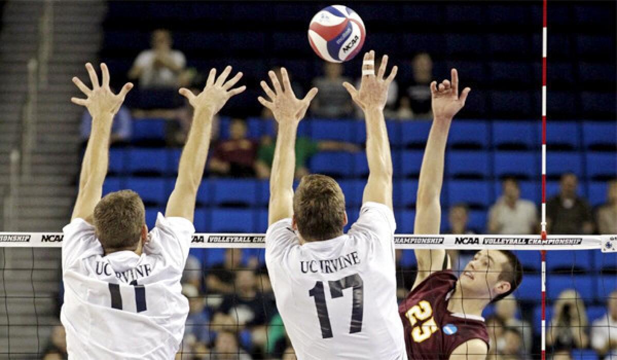 UC Irvine's Scott Kevorken (11) and Zack La Cavera (17) defend against a shot by by Loyola Chicago's Thomas Jaeschke in the third set of the Anteaters' sweep of the Ramblers, 26-24, 25-18, 29-27.