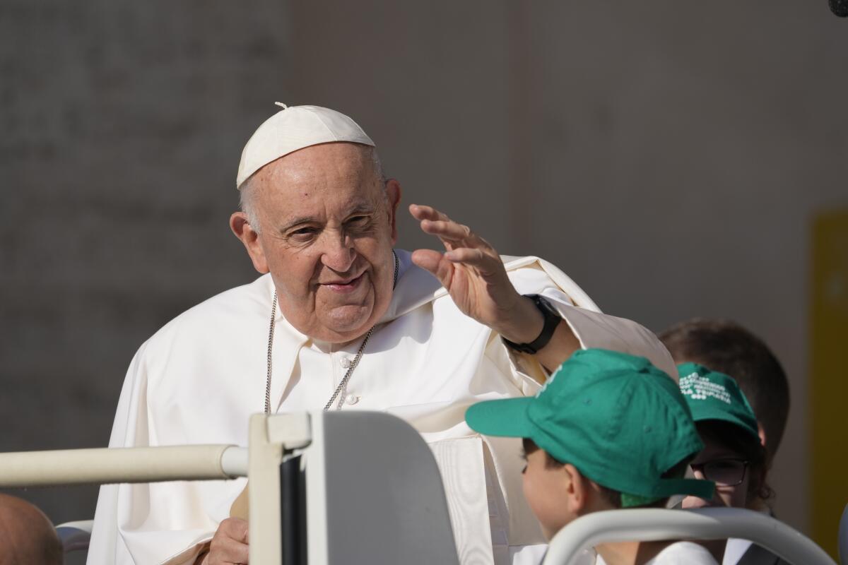 Pope Francis waving