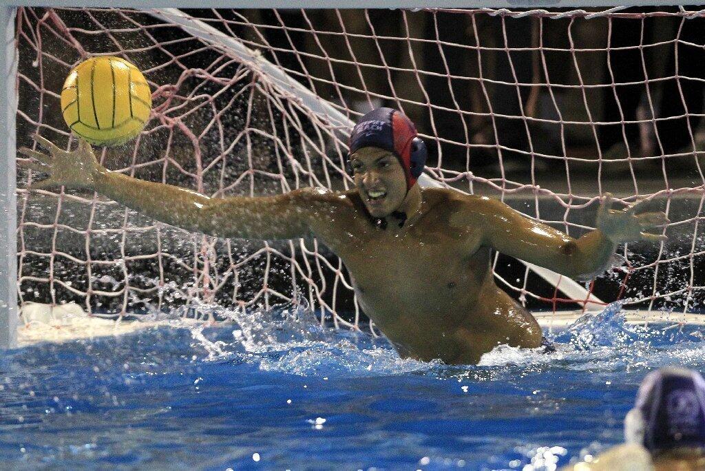 Newport Harbor High goalkeeper Massimo Navaretta defends at the net during the second half against Corona del Mar in the Battle of the Bay game on Saturday.