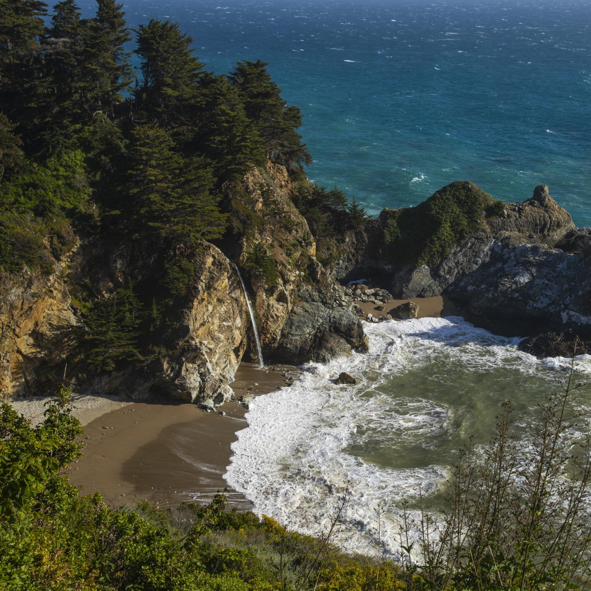 McWay Falls drops over an 80-foot cliff onto the beach at Julia Pfeiffer Burns State Park. 