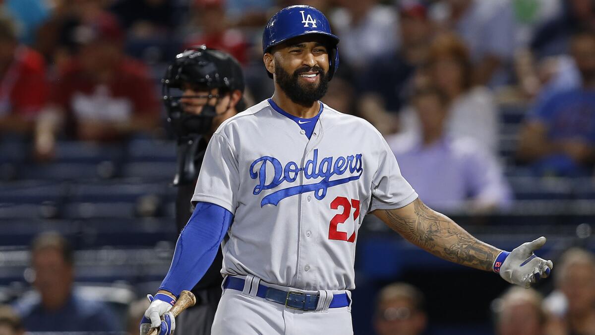 Dodgers right fielder Matt Kemp reacts after a called strike during an at-bat in a 3-2 loss to the Atlanta Braves on Wednesday.