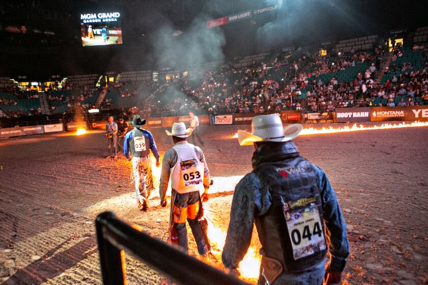 LAS VEGAS, CA - JUNE 13: The entire Bill Pickett Invitational Rodeo lineup enters the MGM Garden Arena for introductions at the start of the nation's only touring black rodeo competition on Sunday, June 13, 2021 in Las Vegas, CA. (Jason Armond / Los Angeles Times)