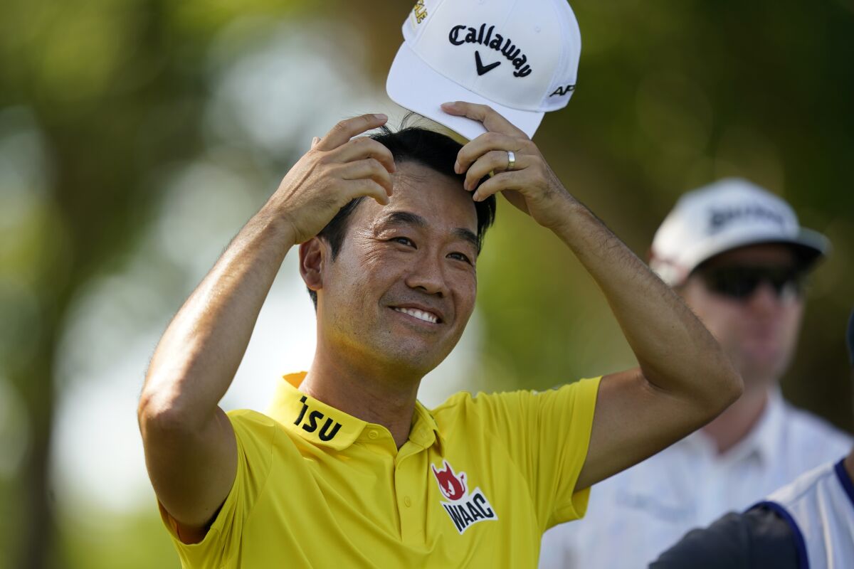 Kevin Na stands at the tee box on the third hole during the second round of the Charles Schwab Challenge golf tournament at the Colonial Country Club, Friday, May 27, 2022, in Fort Worth, Texas. (AP Photo/LM Otero)