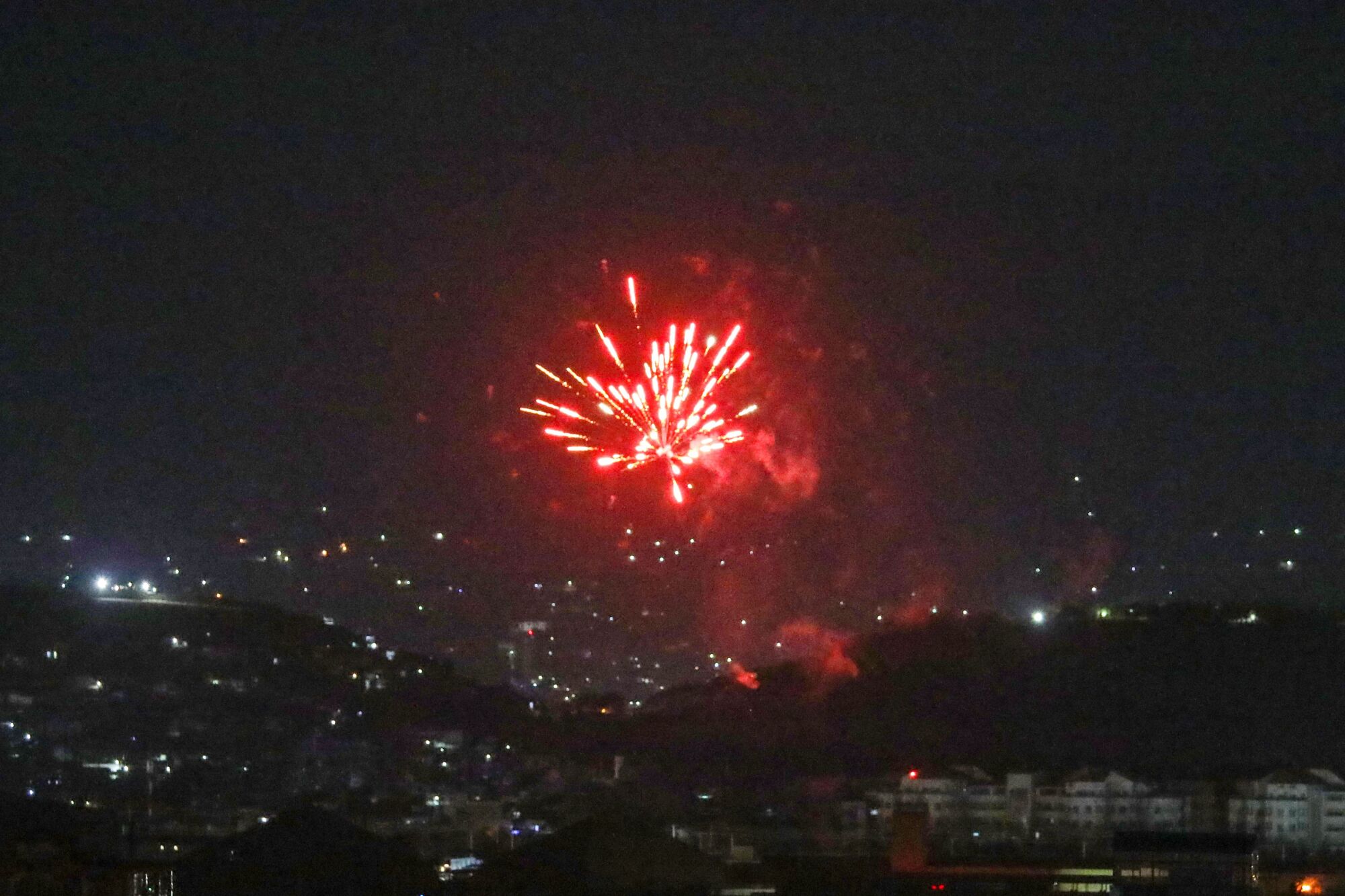 Celebratory gunfires light up part of the night sky after the last US aircraft took off from the airport in Kabul