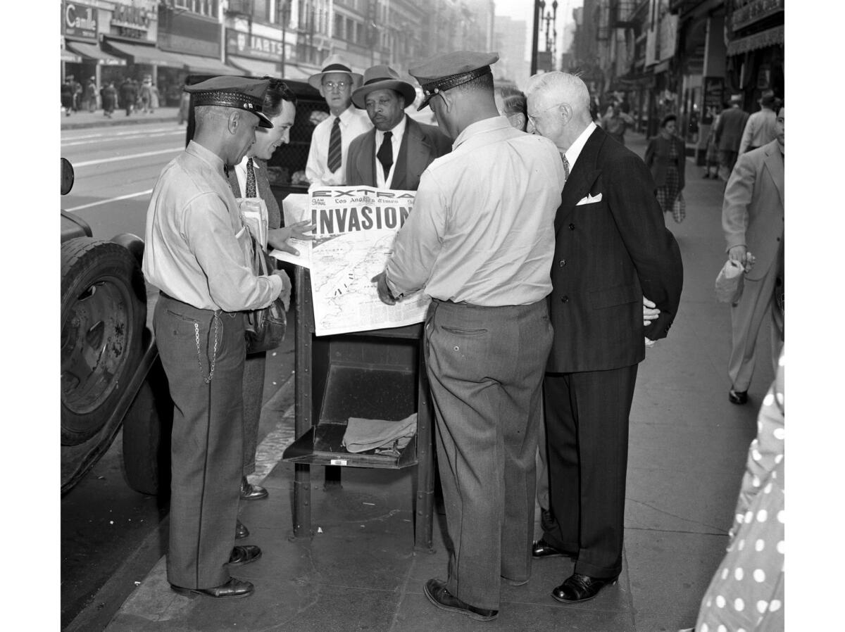 June 6, 1944: A Los Angeles Times extra edition announcing the D-day invasion draws a crowd at 5th Street and Broadway in downtown L.A.