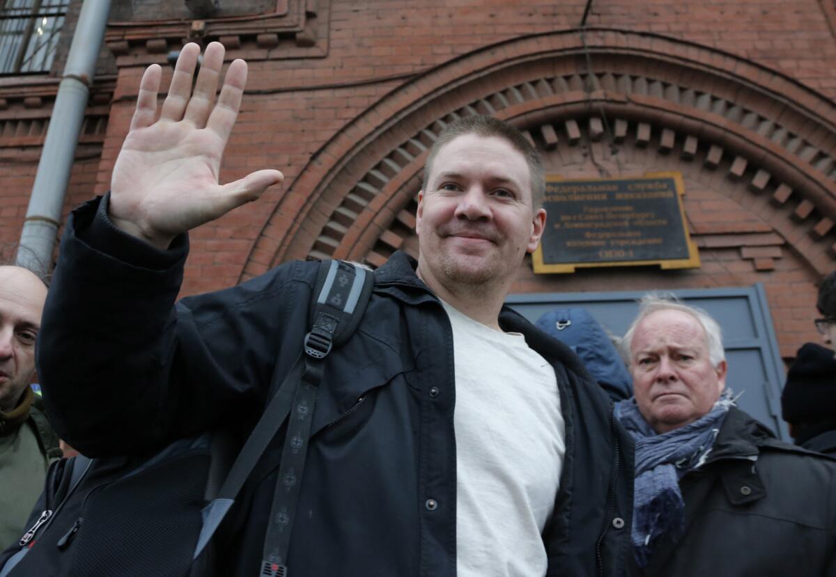 Greenpeace activist Anthony Perrett waves after being released on bail in November in St. Petersburg, Russia.
