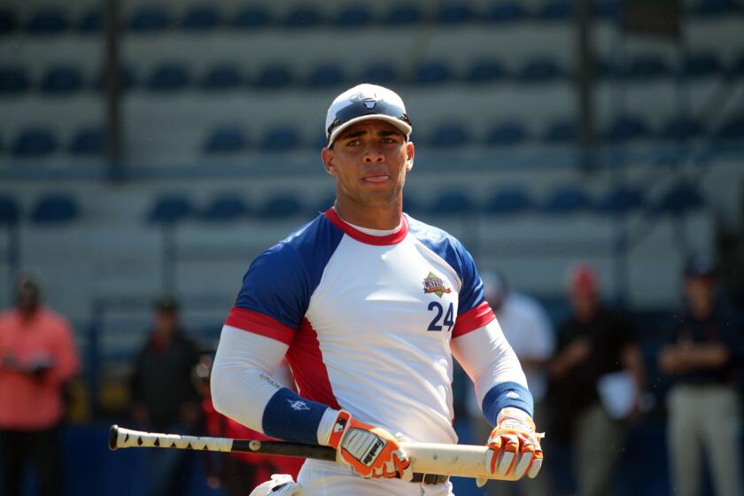 Cuban baseball player Yoan Moncada signed with the Boston Red Sox, according to reports.