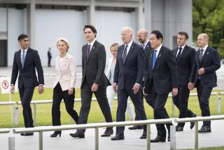 G7 leaders, from left, British Prime Minister Rishi Sunak, European Commission President Ursula von der Leyen, Canadian Prime Minister Justin Trudeau, Italian Premier Giorgia Meloni, U.S. President Joe Biden, European Council President Charles Michel, Japan's Prime Minister Fumio Kishida, French President Emmanuel Macron and German Chancellor Olaf Scholz visit the Peace Memorial Park where they laid wreaths at the Cenotaph before attending the first working session of the G7 Summit in Hiroshima, western Japan, Friday May 19, 2023. (Stefan Rousseau/Pool Photo via AP)