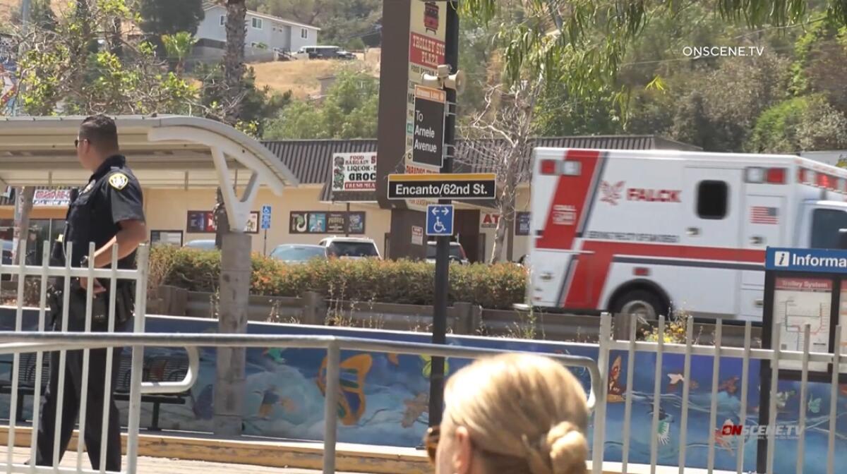 An ambulance transports a stabbing victim Friday morning away from the Encanto/62nd Street MTS orange line station