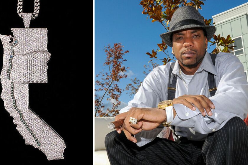 Jevon Lawson, right, wore a diamond pendant with pale green gems mimicing the OxyContin trail from Los Angeles to Washington state.