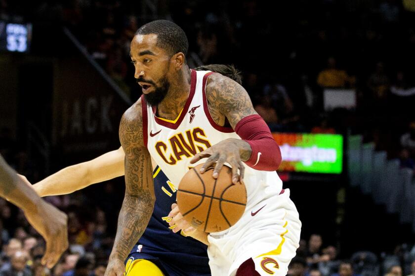 FILE - In this Oct. 8, 2018, file photo, Cleveland Cavaliers guard J.R. Smith dribbles to the basket.