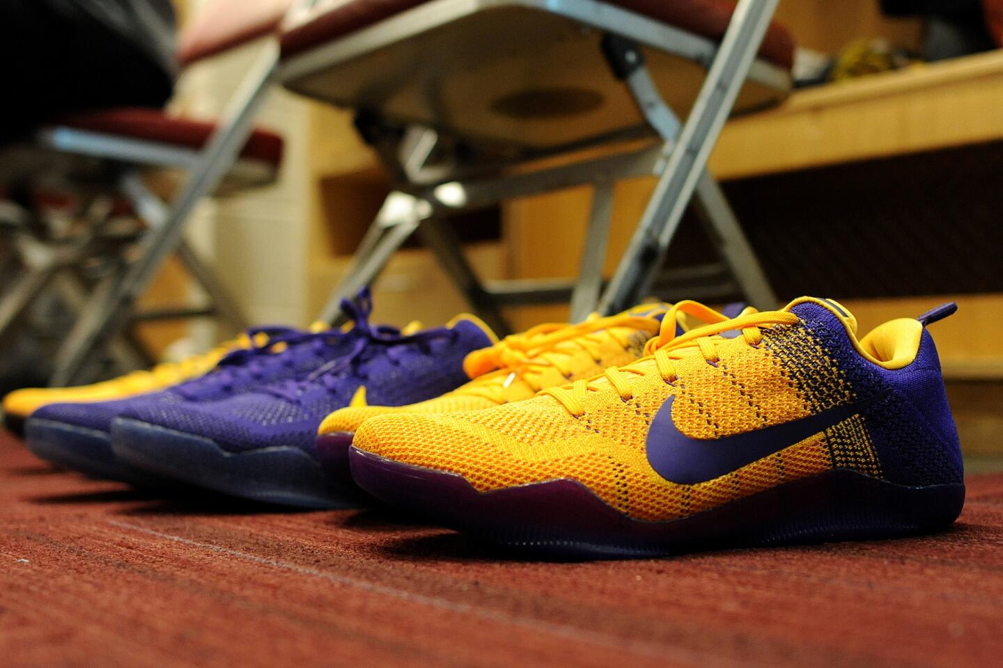 Kobe Bryant's shoes sit in front of his locker before a game against the Rockets in Houston.