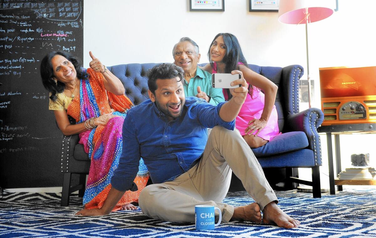The American-raised Ravi Patel, center, seen with mom Champa, dad Vasant and sister/cinematographer Geeta, decided to look into arranged marriage in India and chronicled the experience in the film "Meet the Patels."