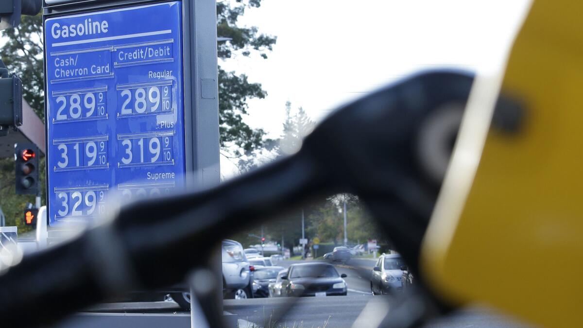 Gasoline prices are displayed at a Chevron station in Sacramento, Calif. on Oct. 30, 2017.