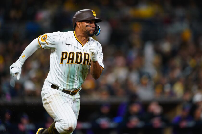 `San Diego, CA - March 30: Padres, Xander Bogaerts singles ion the sixth inning on opening day against the Colorado Rockies on Thursday, March 30. Nelvin C. Cepeda / The San Diego Union-Tribune)