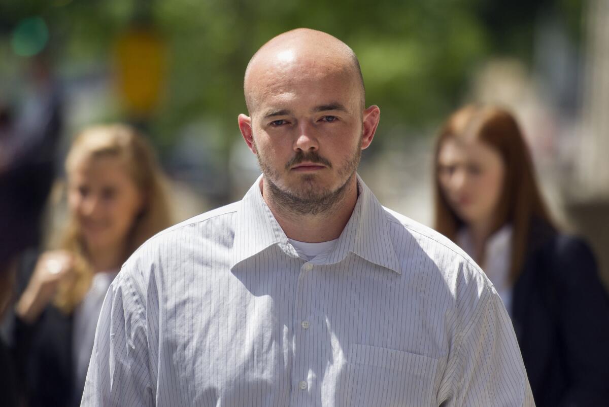 Former Blackwater Worldwide guard Nicholas Slatten leaves federal court in Washington on June 11, 2014.