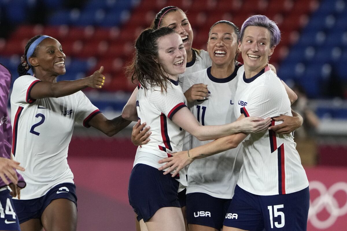 U.S. players celebrate after defeating Netherlands in a penalty shootout at the Olympics on Friday.