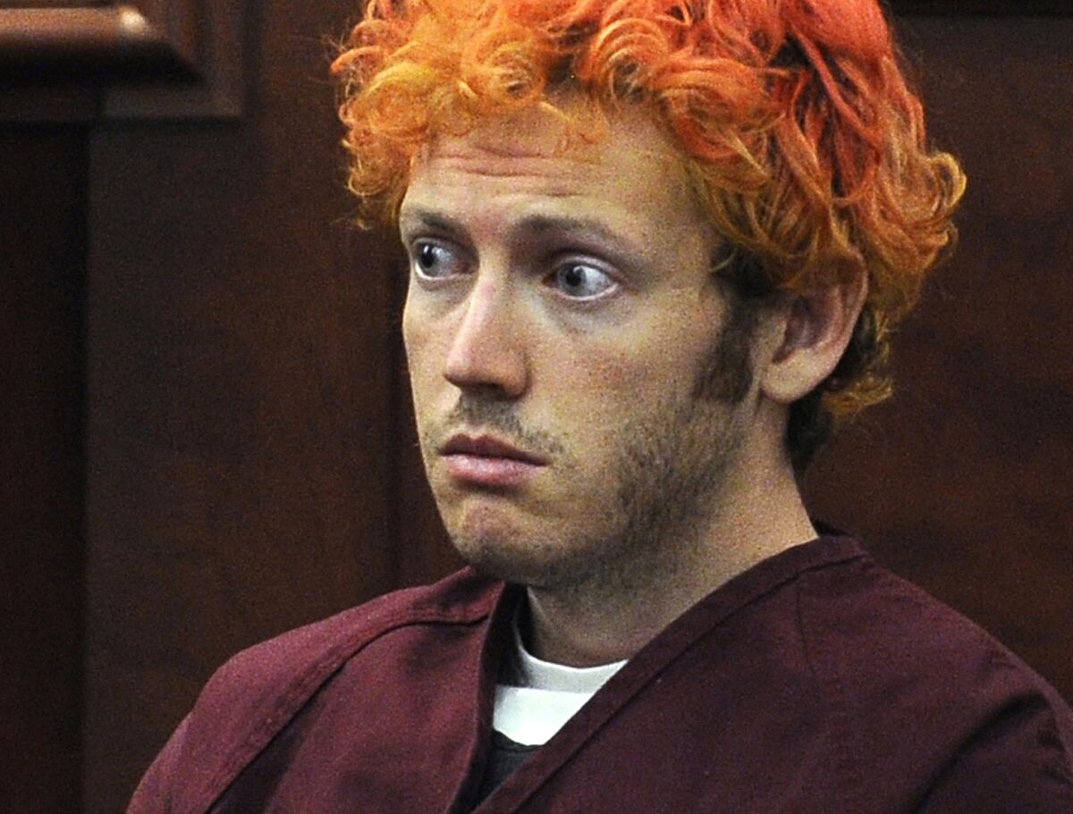 In this July 23, 2012, file photo, James Holmes, who is charged with killing 12 moviegoers and wounding 70 more in a mass shooting in a crowded theater in 2012, sits in Arapahoe County District Court in Centennial, Colo.
