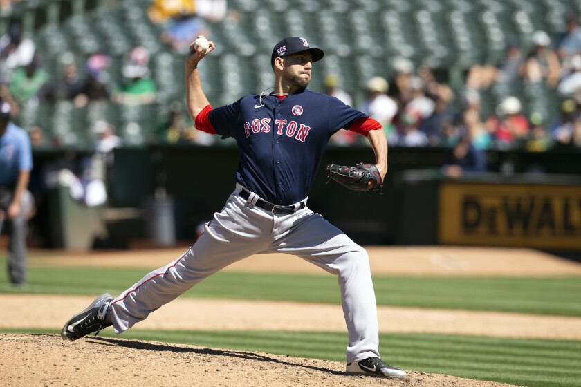 Boston Red Sox pitcher Matt Barnes (32) delivers against the Oakland Athletics during the ninth inning of a baseball game, Sunday, July 4, 2021, in Oakland, Calif. (AP Photo/D. Ross Cameron)