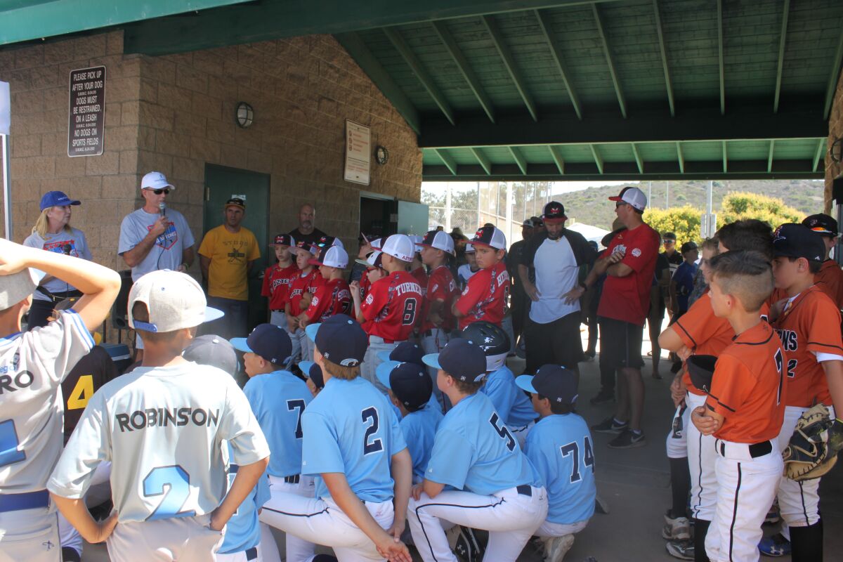 Speakers welcoming players to a previous Grand Slam 4 Mitchell Baseball Tournament.