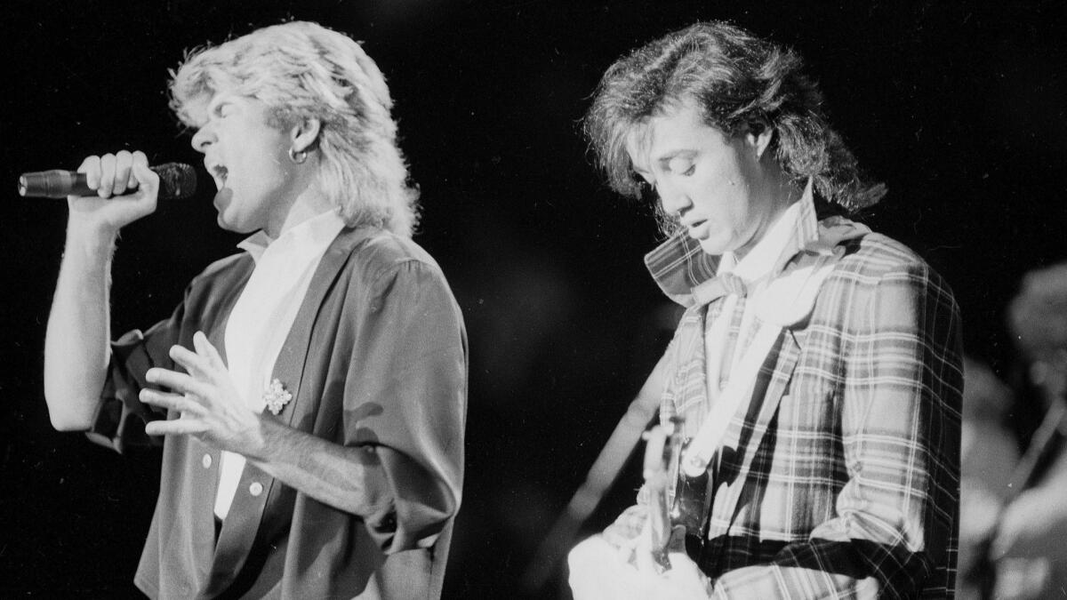 The pop duo Wham! performs in Beijing before a capacity audience of Chinese and foreign fans on April 7, 1985. Singers George Michael, left, and Andrew Ridgeley had youthful fans on their feet despite police warnings to sit down.