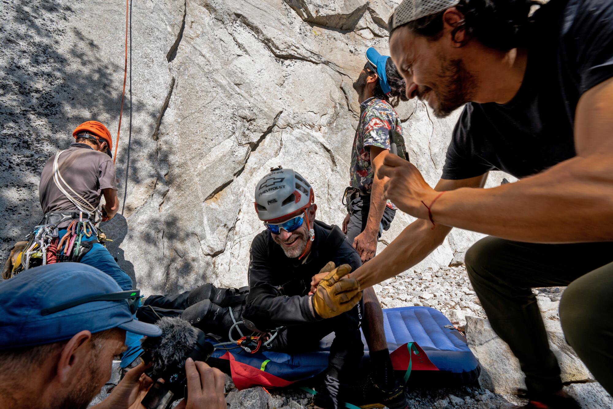 Zuko Carrasco's support team sets up gear at the base of El Capitan. 