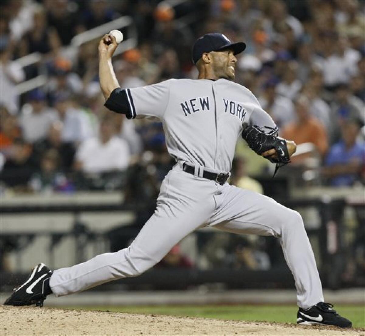 New York Yankees Mariano Rivera throws the last pitch of the 2009