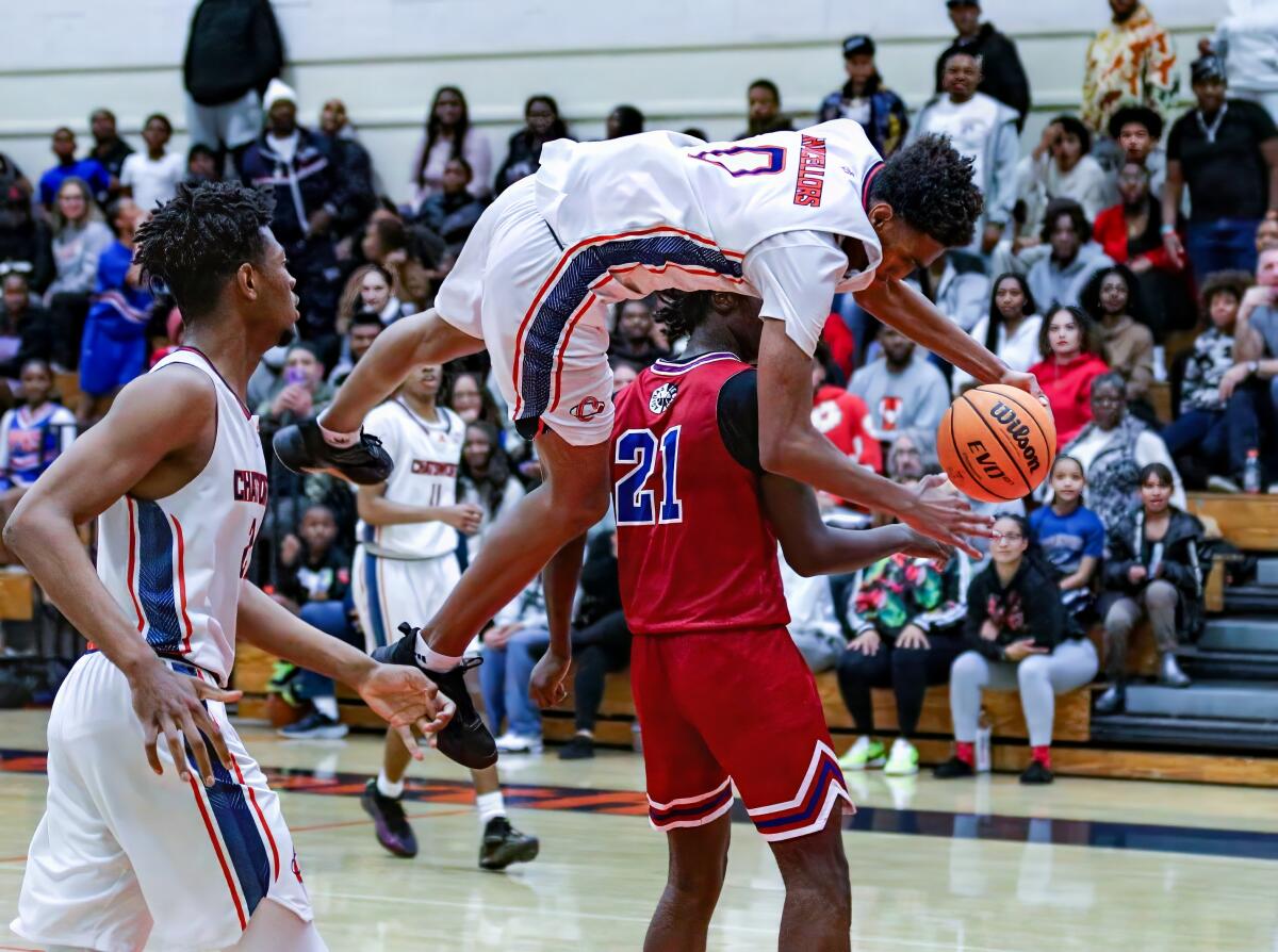 Chatsworth's Alijah Arenas, who scored 53 points, goes airborne driving to the basket.