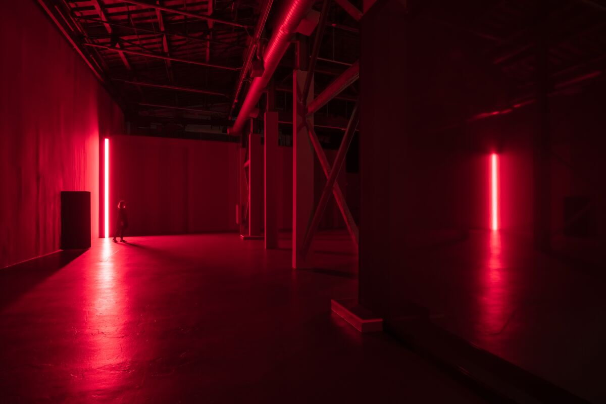 art installation with pink lighting