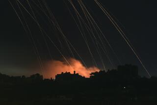 TOPSHOT - This long exposure picture taken from southern Israel near the border with the Gaza Strip shows Israeli shells falling on north Gaza on December 1, 2023. A temporary truce between Israel and Hamas expired on December 1, with the Israeli army saying combat operations had resumed, accusing Hamas of violating the operational pause. (Photo by John MACDOUGALL / AFP) (Photo by JOHN MACDOUGALL/AFP via Getty Images)