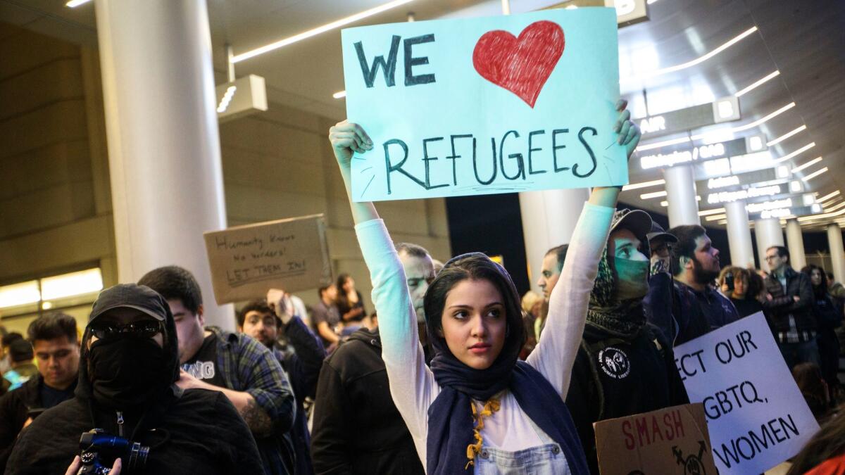 Supporters of refugees protest outside Tom Bradley International Terminal at LAX after President Trump's first travel ban.