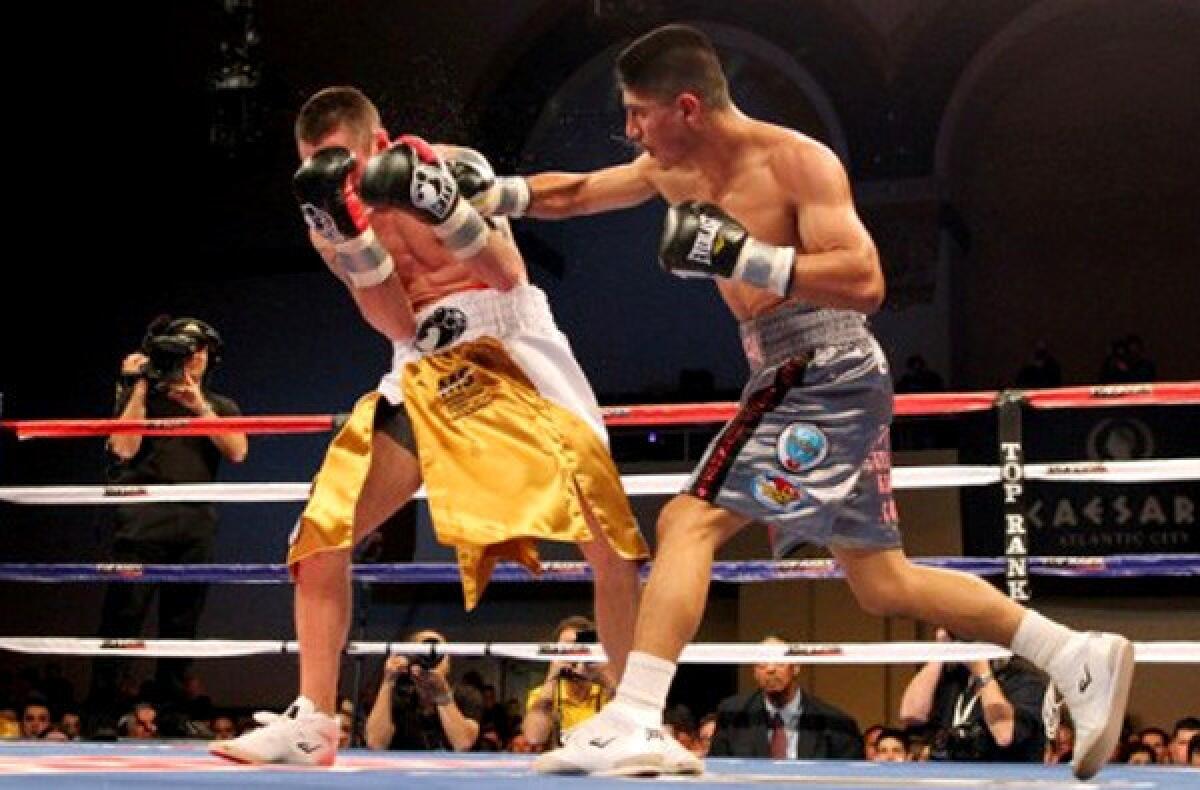 Mikey Garcia, right, lands a blow against Matt Remillard during a victory in 2011.