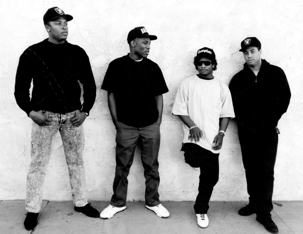 N.W.A.'s Dr. Dre, left, MC Ren, Eazy-E and DJ Yella in Los Angeles, Jan. 26, 1990. Ice Cube left the band in 1989 over a royalty dispute.