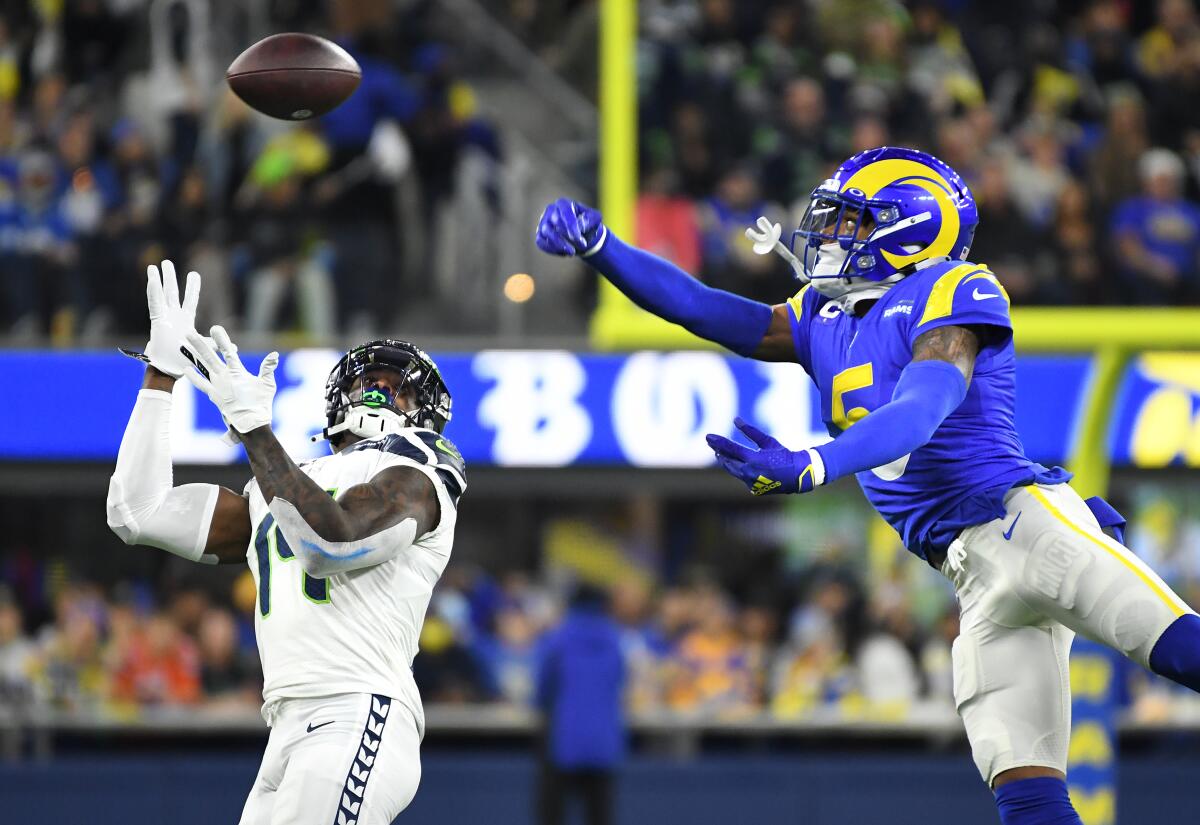 Rams cornerback Jalen Ramsey deflects a pass intended for the Seahawks' DK Metcalf on Tuesday.