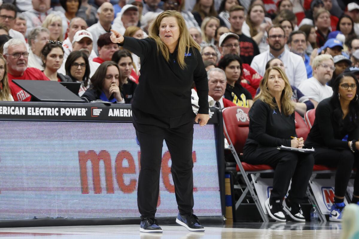 UCLA coach Cori Close instructs her players during a win over Ohio State on Dec. 18.