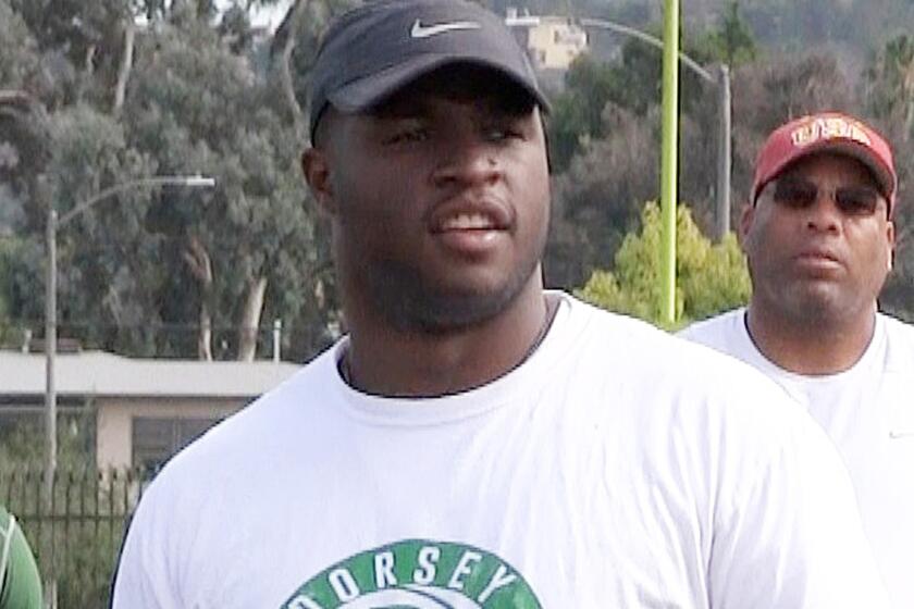 Former USC running back Stafon Johnson is working as an assistant coach at Dorsey High School.