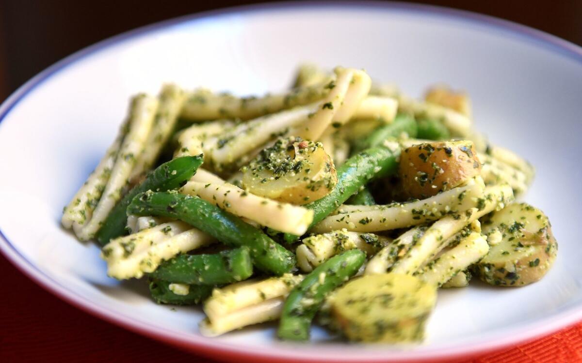 Strozzapreti or trenette with pesto, green beans and potatoes