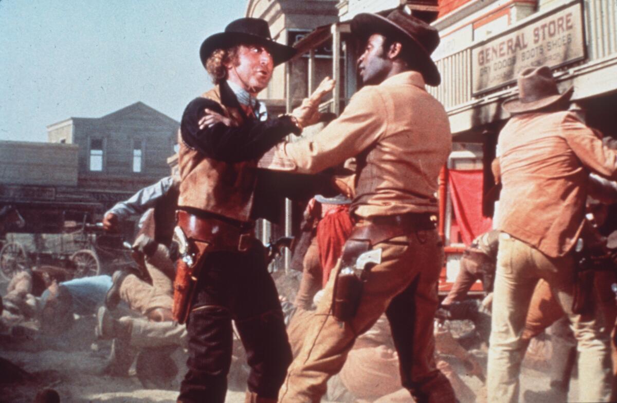 Gene Wilder, left, and Cleavon Little are caught up in a brawl the 1974 Blazing Saddles" (1974).