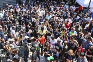 FILE - Thousands of Boeing machinists make their way to the exits to cast their vote after the "stop work meeting" and strike sanction at T-Mobile Park in Seattle, July 17, 2024. (Kevin Clark/The Seattle Times via AP, File)