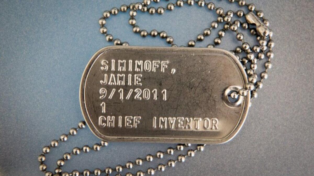 Siminoff treats employees as confidants in war, bestowing them with dog-tag-style security badges inscribed with name, start date and title.