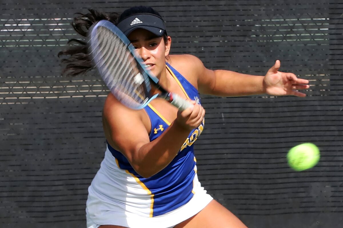 Fountain Valley's Gisele Rico runs to return a serve in a girls' tennis final against Beverly Hills on Friday.