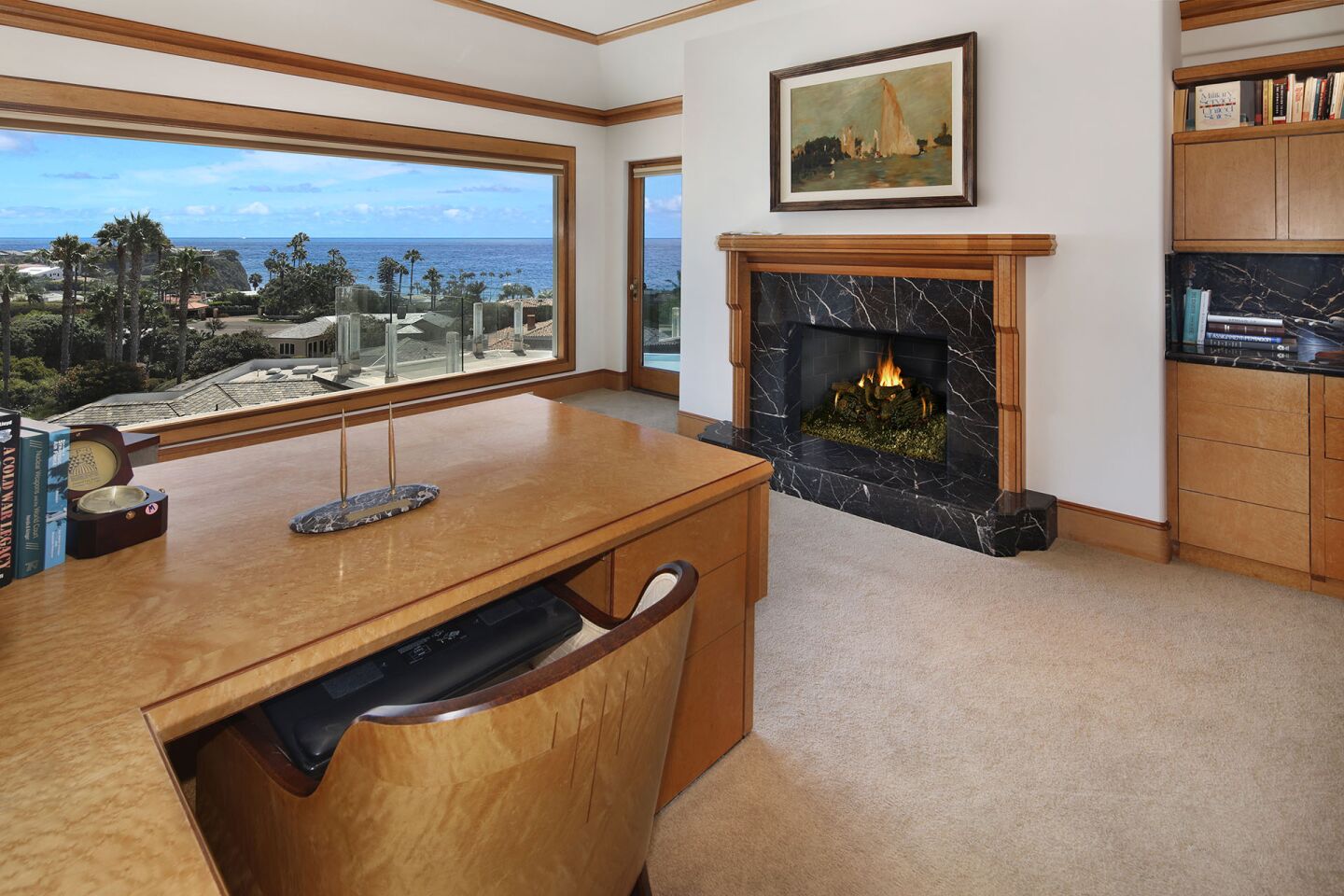 An office with a fireplace is part of the master suite.