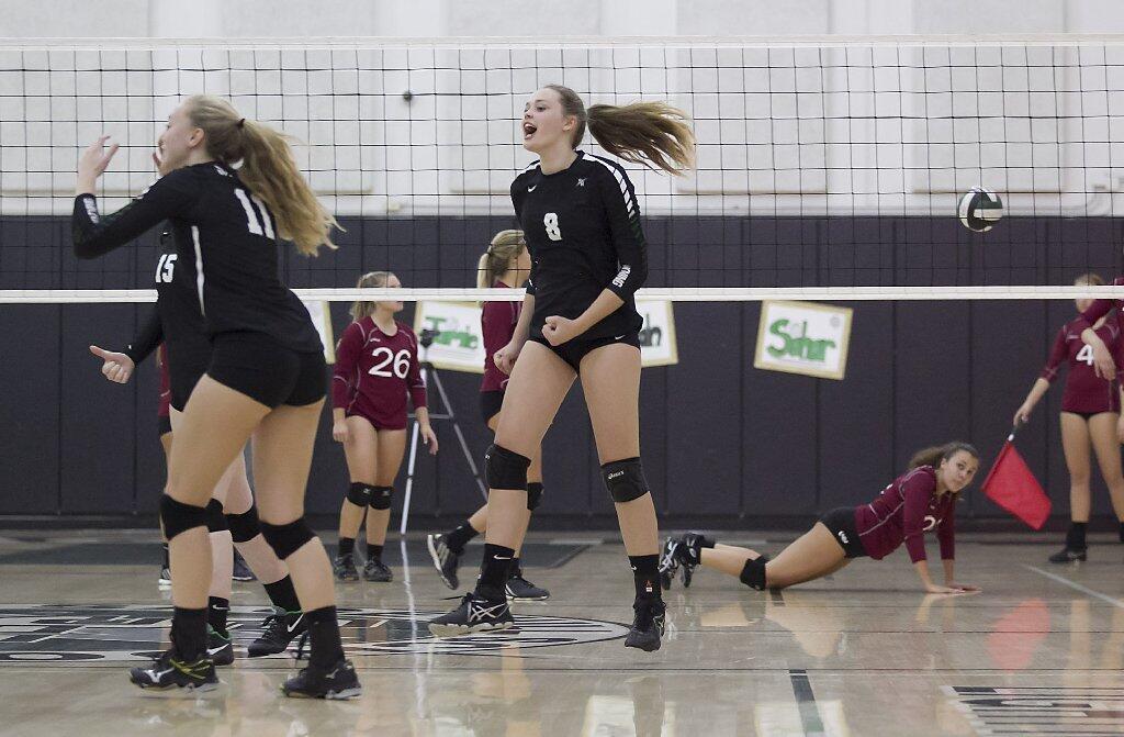 Sage Hill School's Danielle Beder exults after a big rally and point against Laguna Beach.