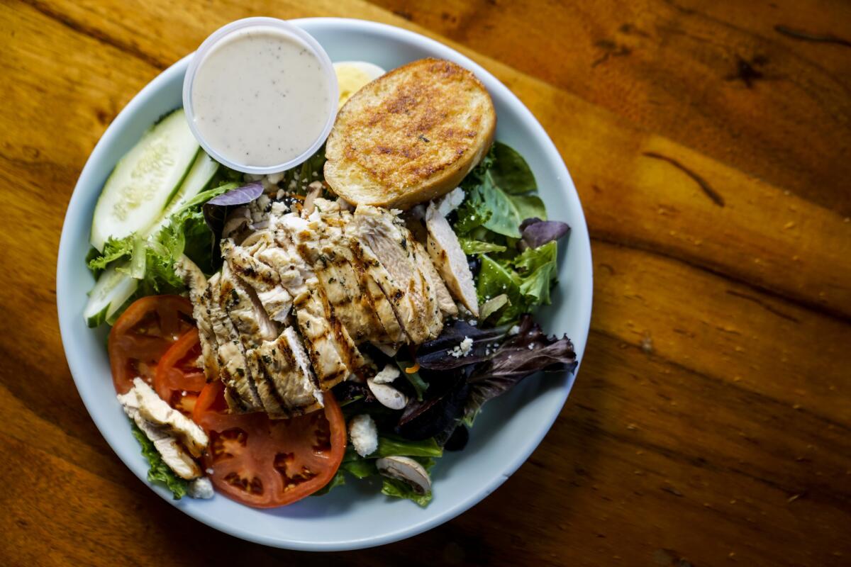 Chicken Caesar salad, photographed at La Mariana.