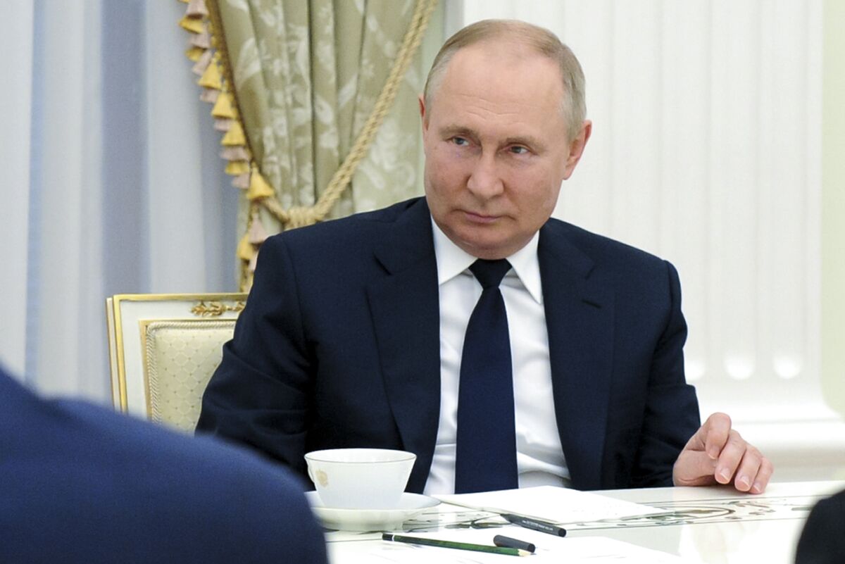 Russian President Vladimir Putin speaks to winners of the Leaders of Russia Competition, the flagship project of the Russia - Land of Opportunity presidential platform in the Kremlin in Moscow, Russia, Thursday, July 7, 2022. (Mikhail Klimentyev, Sputnik, Kremlin Pool Photo via AP)