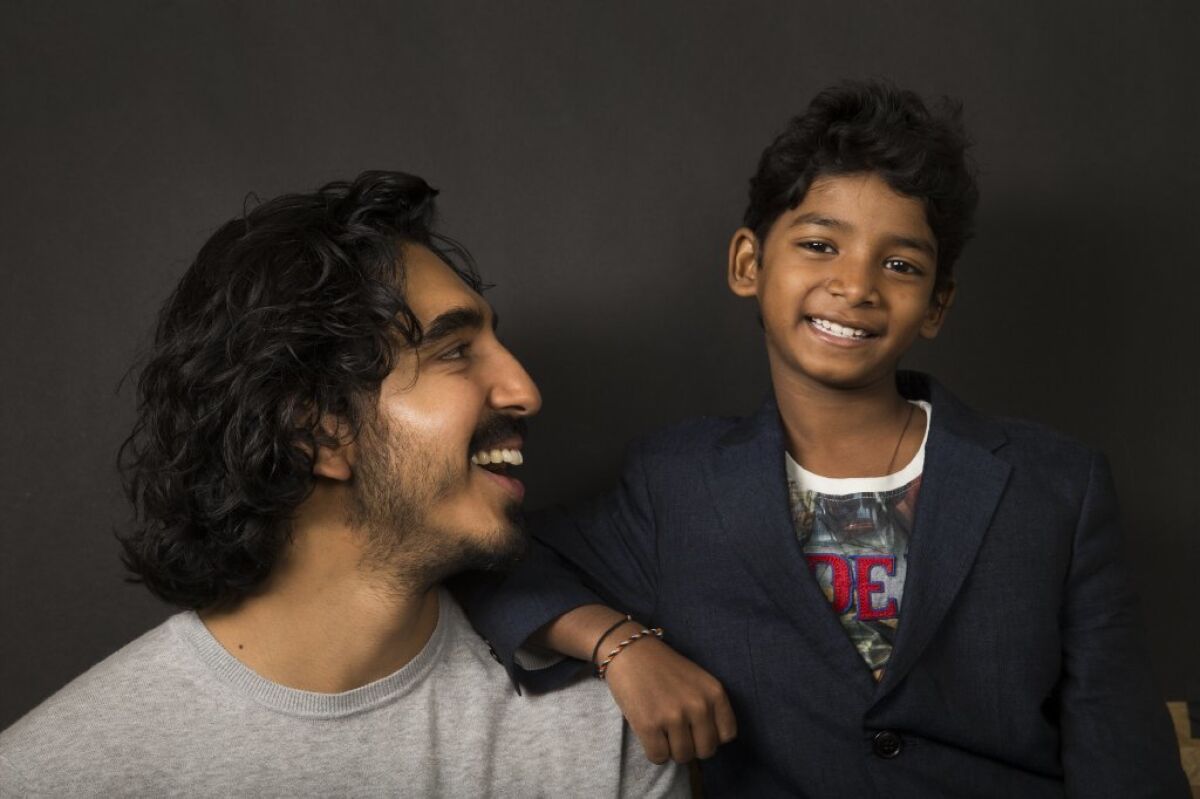 For Dev Patel, left, watching his "Lion" costar Sunny Pawar's scenes as the younger version of his character helped him understand his character's history.