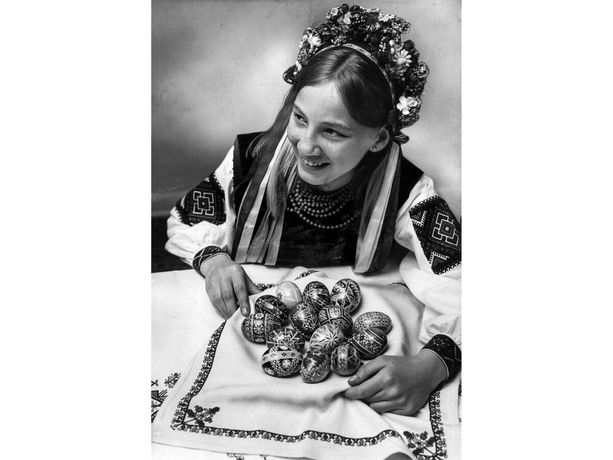 April, 1968: Katherine Kenal, 14, clad in costume of her ancestors, shows Ukrainian-style Easter eggs created in class held at the Nativity of the Blessed Virgin Mary Ukrainian Catholic Church in Hollywood.