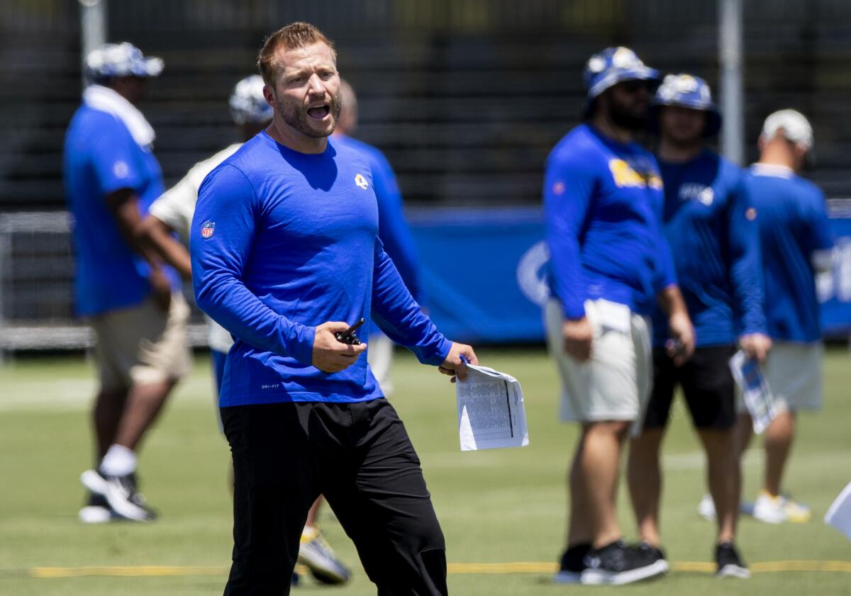 Rams coach Sean McVay calls out plays during training camp.