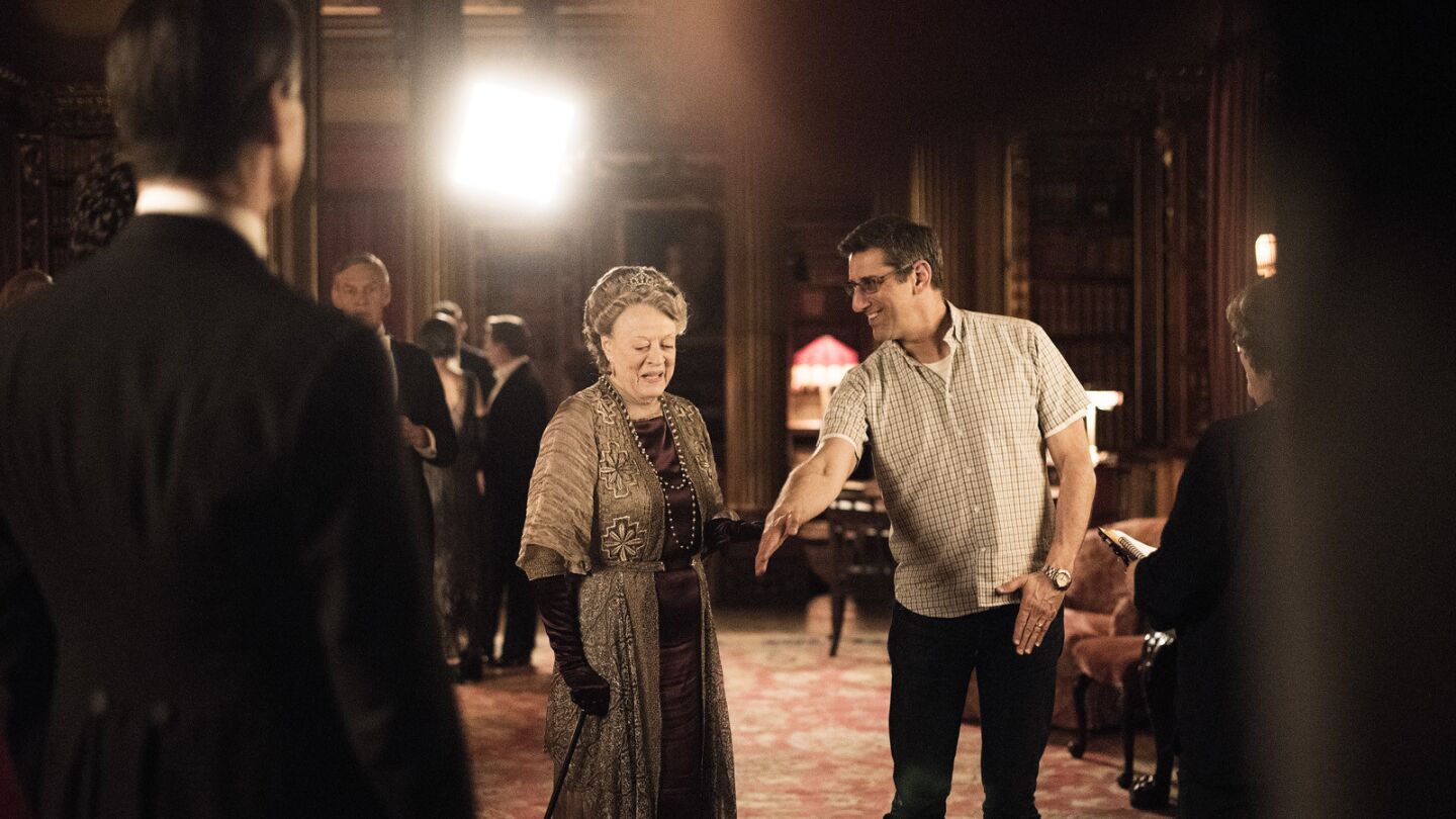 Maggie Smith and director Michael Englar discuss a scene before filming "Downton Abbey" in the upstairs set at Highclere Castle.